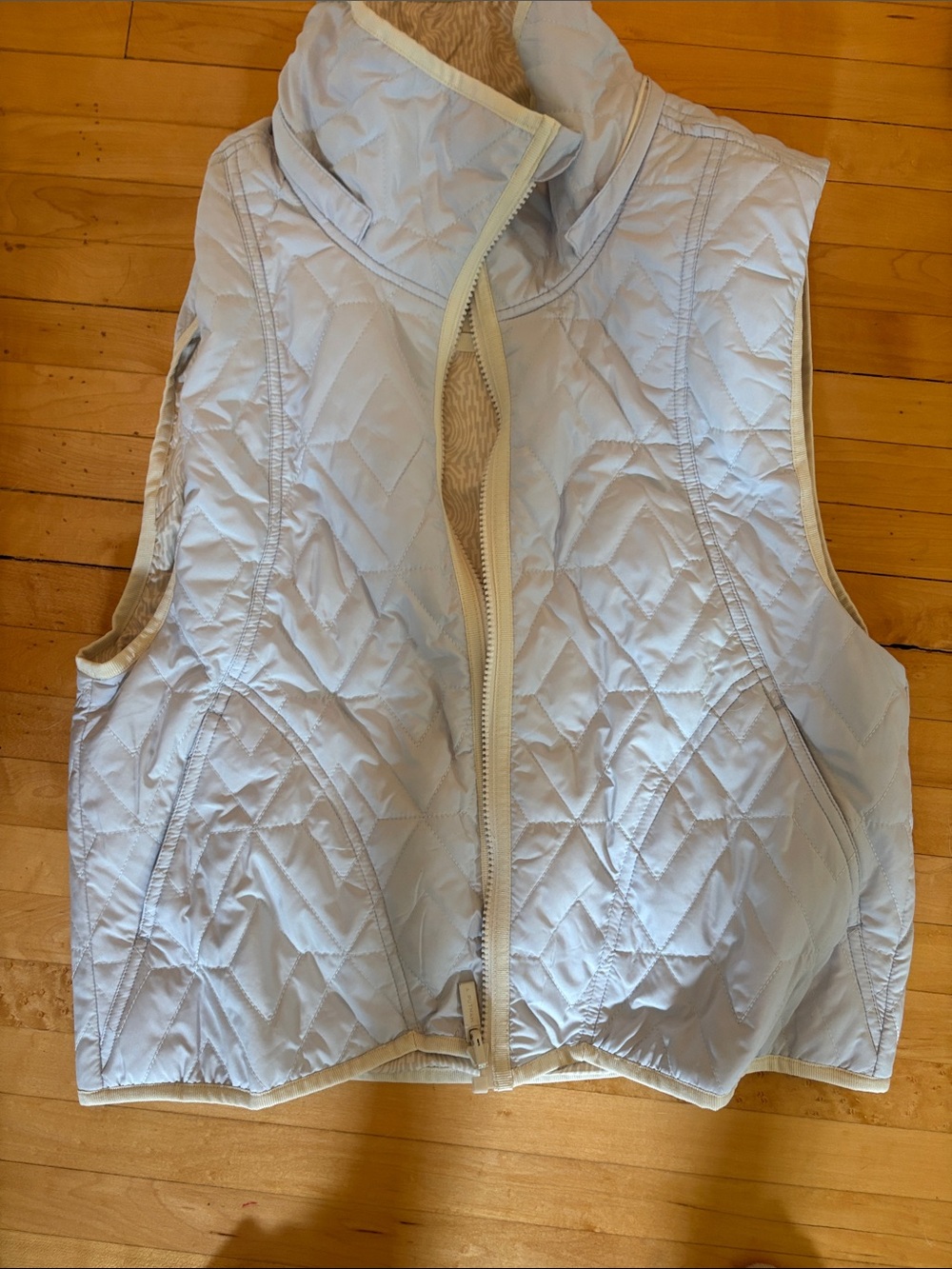 A Putnam Quilted Sleeveless Puffer Vest in Light Blue